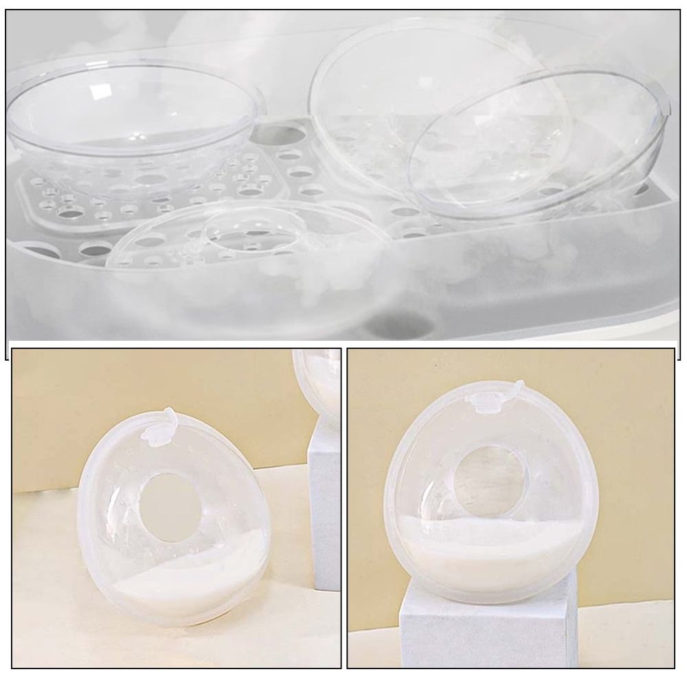 Two leakproof silicone collector shells for breastfeeding moms, soft, reusable, and comfortable for discreet postpartum use.