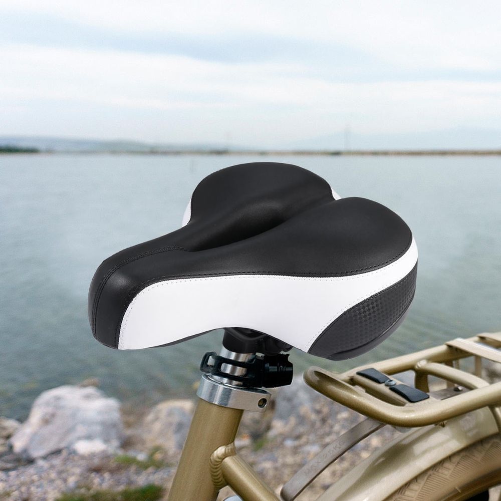 White thick gel mountain bike saddle with central airflow and reflective back, designed for kids' bikes from Everything Baby.