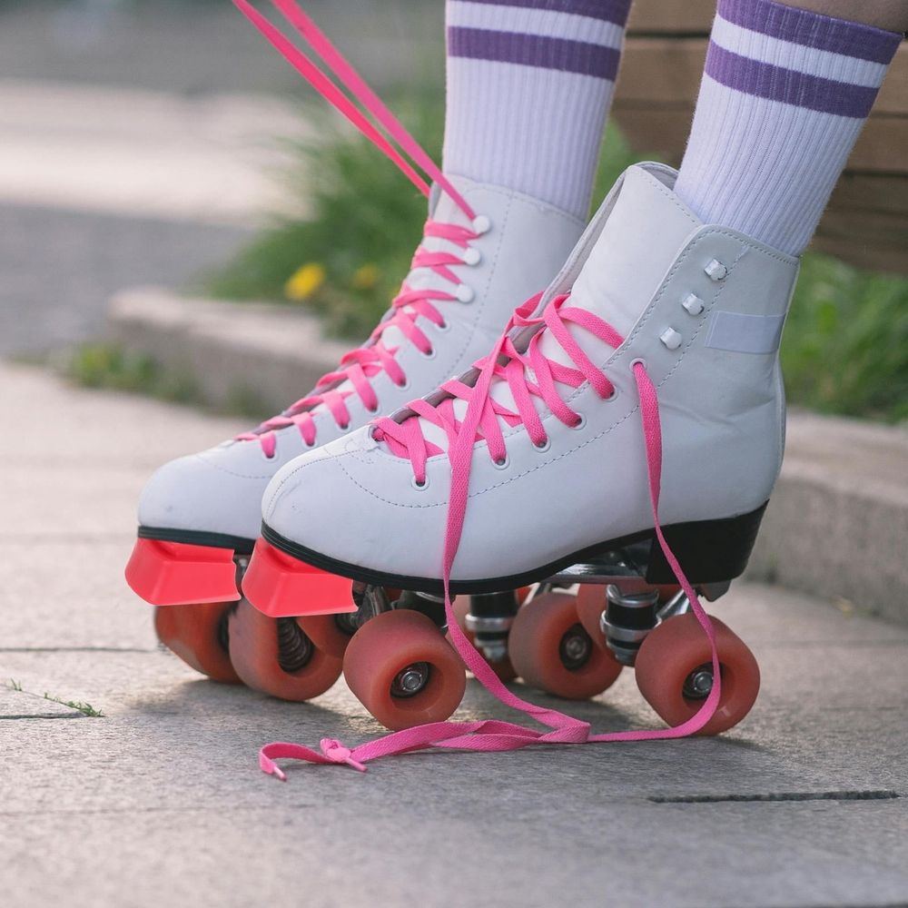 Two red inline skate brake pads replacement rubber for roller skates, enhancing traction and safety for kids' bikes and scooters.