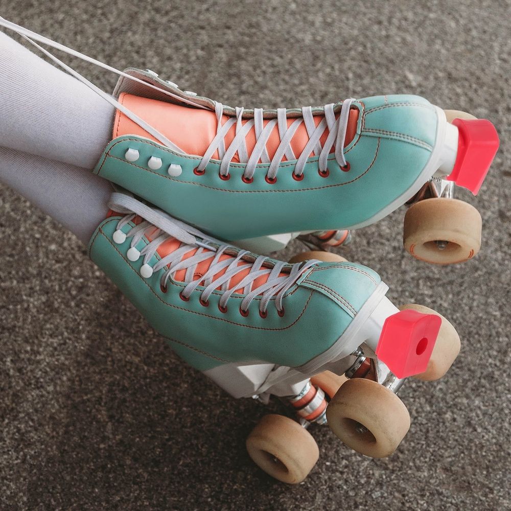 Two red inline skate brake pads replacement rubber for roller skates, providing enhanced traction and safety for kids' bikes and scooters.