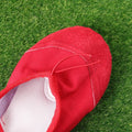 Pair of durable red girl’s shoes with anti-slip soles for kids, featuring stylish design from Everything Baby.
