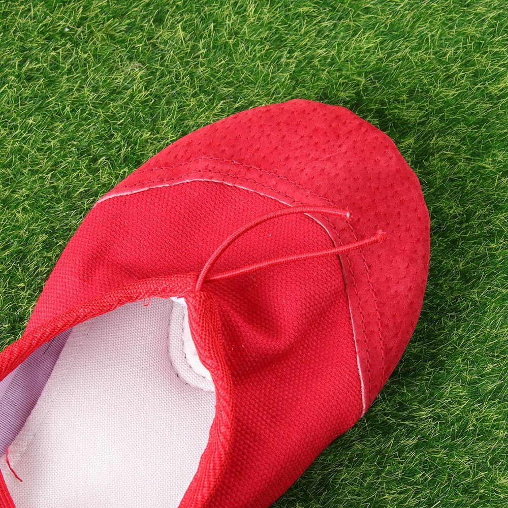 Pair of durable red girl’s shoes with anti-slip soles for kids, featuring stylish design from Everything Baby.