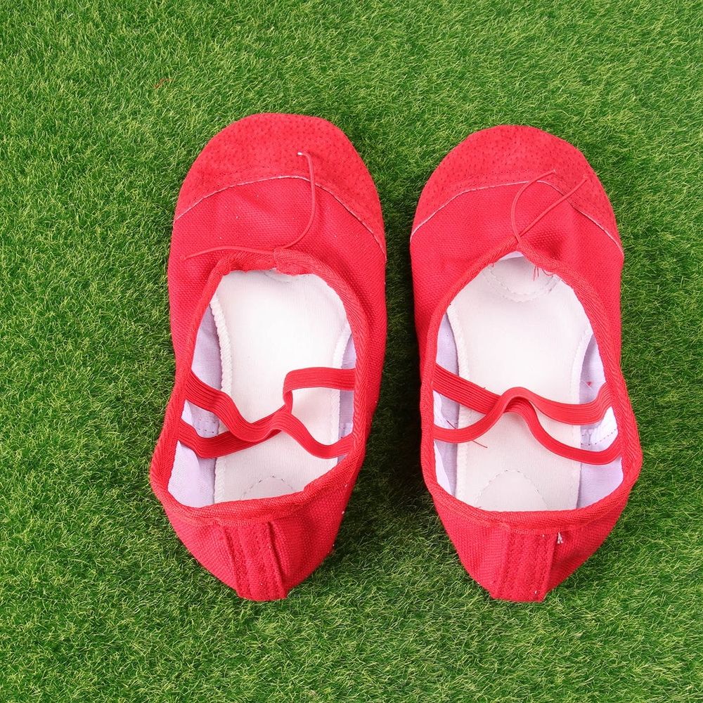Pair of durable red girls' shoes with anti-slip soles from Everything Baby, perfect for modern kids' casual wear.