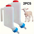 Two portable goat milk bottles from Everything Baby, sturdy plastic with handles, designed for lambs and baby goats.