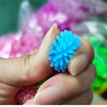 Set of 15 colorful small massage balls with hedgehog design, ideal for baby foot and body relaxation and play.