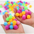 Set of 15 colorful small massage balls with hedgehog design for kids, ideal for foot and body relaxation, in random colors.