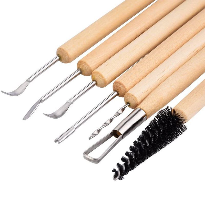 Set of 11 pottery clay sculpting tools with double-sided ceramic tips and wooden handles, ideal for trimming and embossing in ceramics.