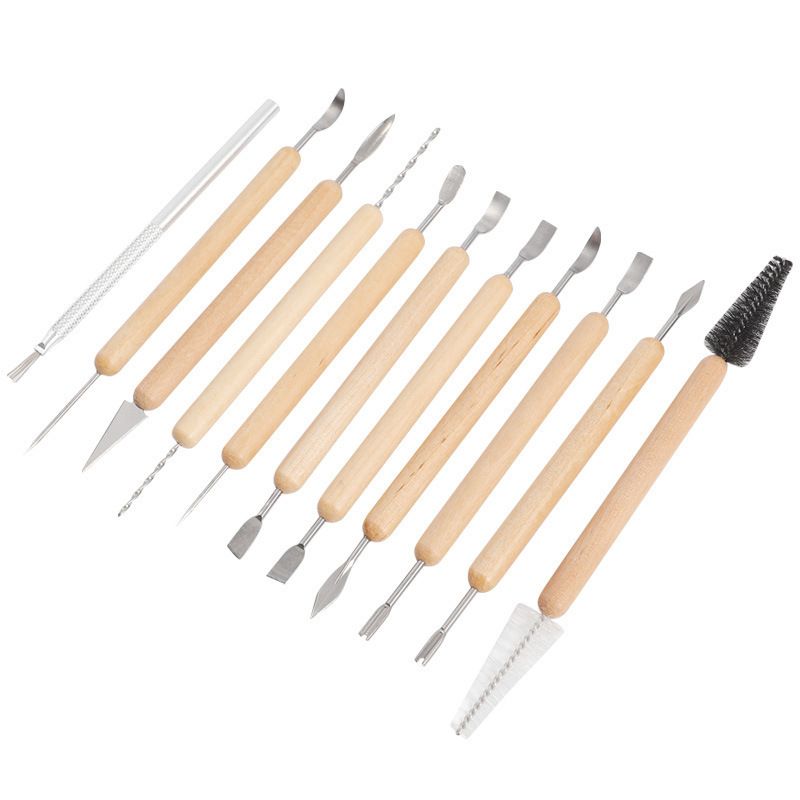 Set of 11 pottery clay sculpting tools with double-sided blades and wooden handles, ideal for ceramics and embossing projects.