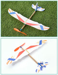 Rubber band powered airplane toy for kids, featuring a colorful random pattern, suitable for indoor and outdoor pretend play.