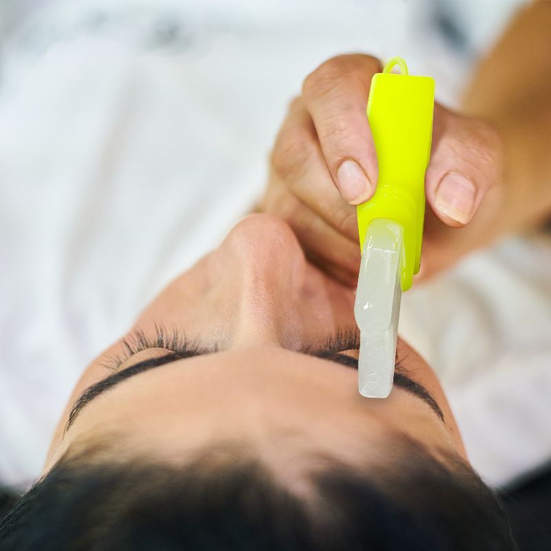 Two facial ice rollers for face and eye massage, skincare tools for cooling and soothing skin, by Everything Baby.