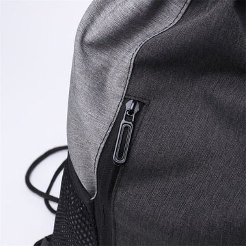 Gray drawstring gym bag with bottle holder, waterproof kids' backpack for sport, gym, or travel by Everything Baby.