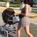 Grey portable baby changing pad with travel bag, smart design for easy diaper changes on the go, from Everything Baby.