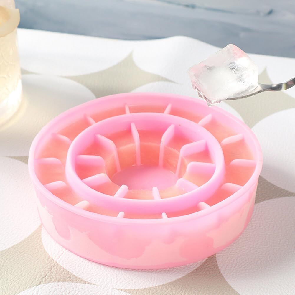 Two folding silicone ice cube molds with lids for making reusable ice cubes for cold drinks, suitable for baby and kids feeding.