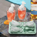 Silicone Labrador dog-shaped ice cube mold with four cute dog-shaped ice balls for whiskey or drinks.