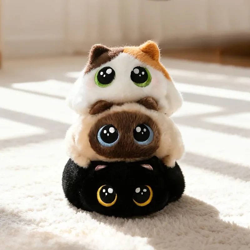 Soft, fluffy calico cat plush toy with big eyes, perfect for cuddling and play, designed for babies and kids by Everything Baby.