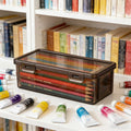 Large clear plastic pencil case with snap lid, ideal for kids' art supplies, crayon and marker storage by Everything Baby.