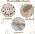 Pink wooden Tooth Fairy box with lid and mini tweezers for kids' baby teeth storage, featuring a pink bow and natural finish.