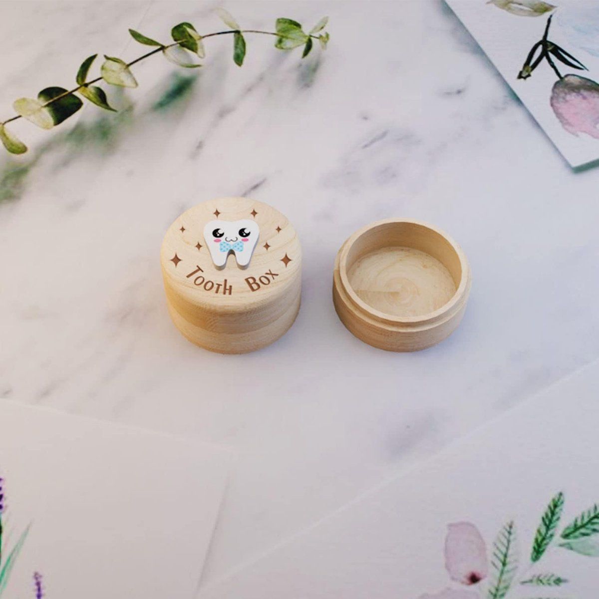 Natural wooden tooth fairy box with printed lid and mini tweezers, designed for kids' baby teeth storage, beige small size.