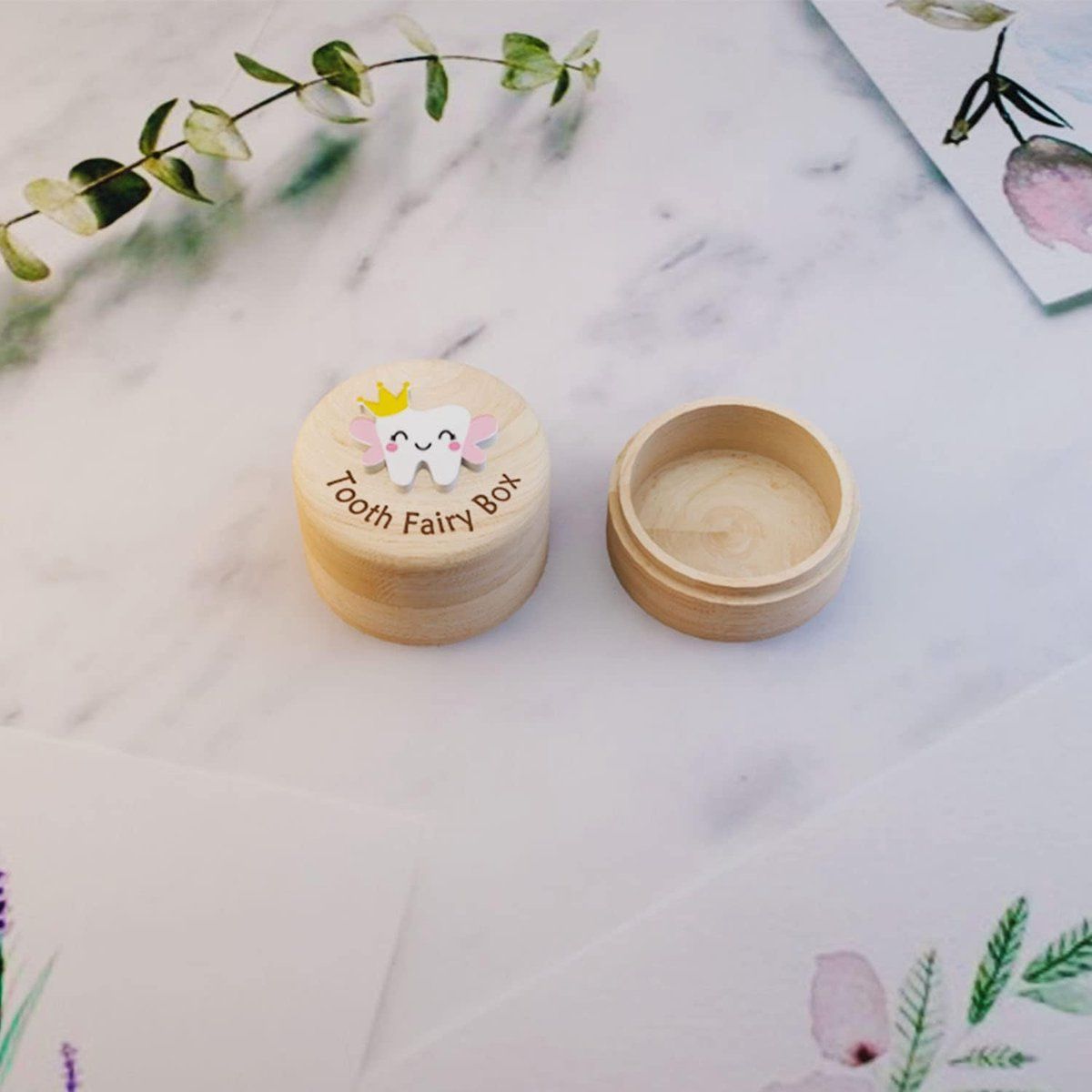 Wooden tooth fairy box with lid and mini tweezers for kids, natural wood keepsake case for baby teeth storage.