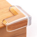 Eight clear baby corner protectors from Everything Baby, adhesive L-shaped guards for nursery furniture safety, transparent and child-friendly.