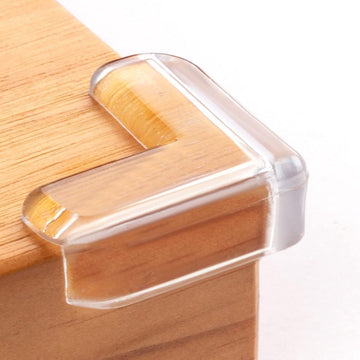 Eight clear baby corner protectors from Everything Baby, adhesive L-shaped guards for nursery furniture safety, transparent and child-friendly.