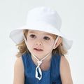 White baby sun hat with wide brim, lightweight breathable cotton, foldable beach bucket hat for boys and girls, size 0-8 months