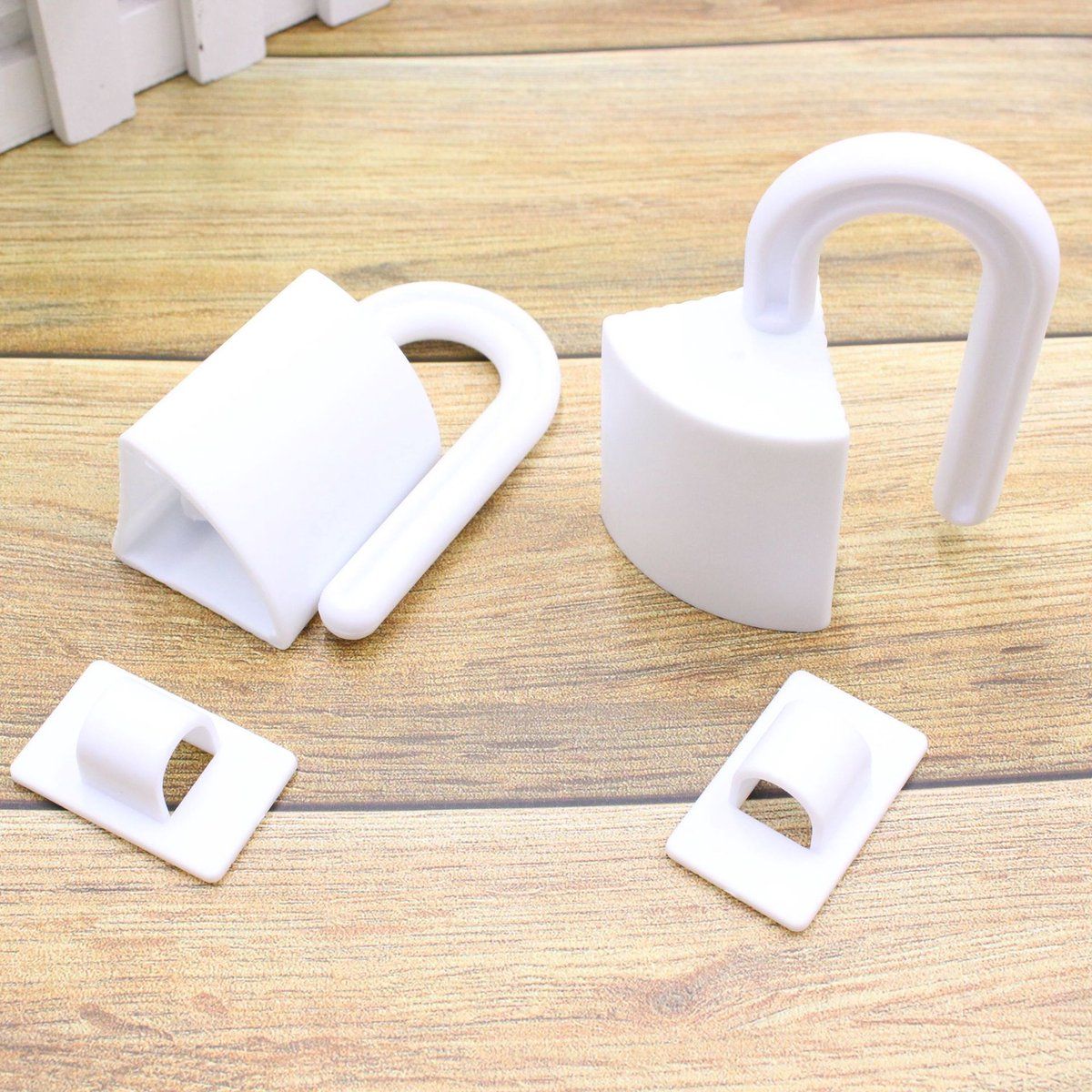 White 4-pack door finger pinch guard set with hooks, ABS anti-slam buffer for child safety, suitable for babies, kids, and pets.