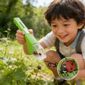White handheld insect catcher with magnifier, bug viewer, and tweezers for kids' outdoor bug-catching toy by Everything Baby.