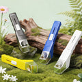 Blue handheld insect catcher with magnifier for kids, outdoor bug viewing and catching toy, ideal for nature science exploration.