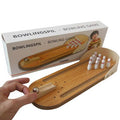 Colorful tabletop bowling game for kids by Everything Baby, featuring small pins and a ball for fun indoor activity.