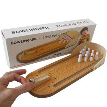 Colorful tabletop bowling game for kids by Everything Baby, featuring small pins and a ball for fun indoor activity.