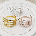 Black ghost-shaped napkin ring with alloy material, Halloween-themed hand napkin buckle for festive tableware.
