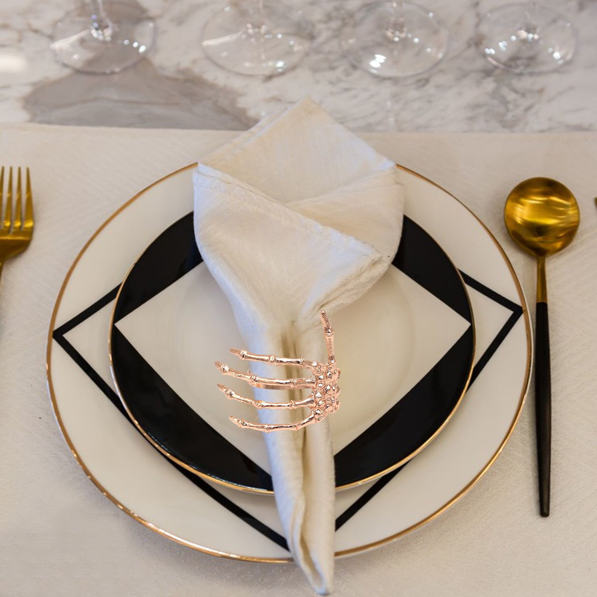 Black ghost-shaped napkin ring with alloy material, designed for Halloween-themed tableware and napkin decoration.