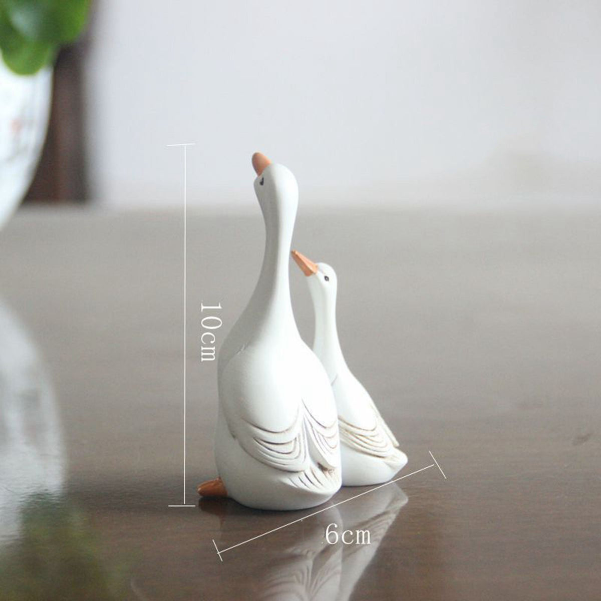 Synthetic resin mother and baby duck toy, realistic model for household decor and pretend play, by Everything Baby.