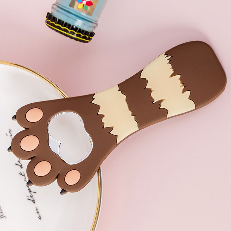 Colorful silicone cat paw bottle opener with fridge magnet, vibrant stripes, and playful design, perfect for kitchen use.