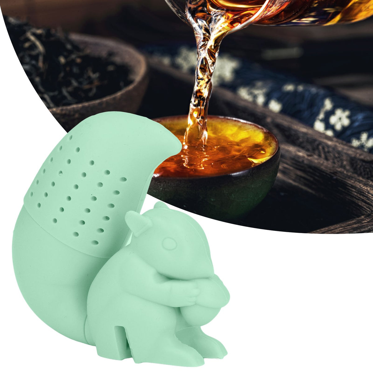 Green silicone squirrel-shaped tea infuser filter for brewing loose leaf tea, featuring a cute squirrel design.