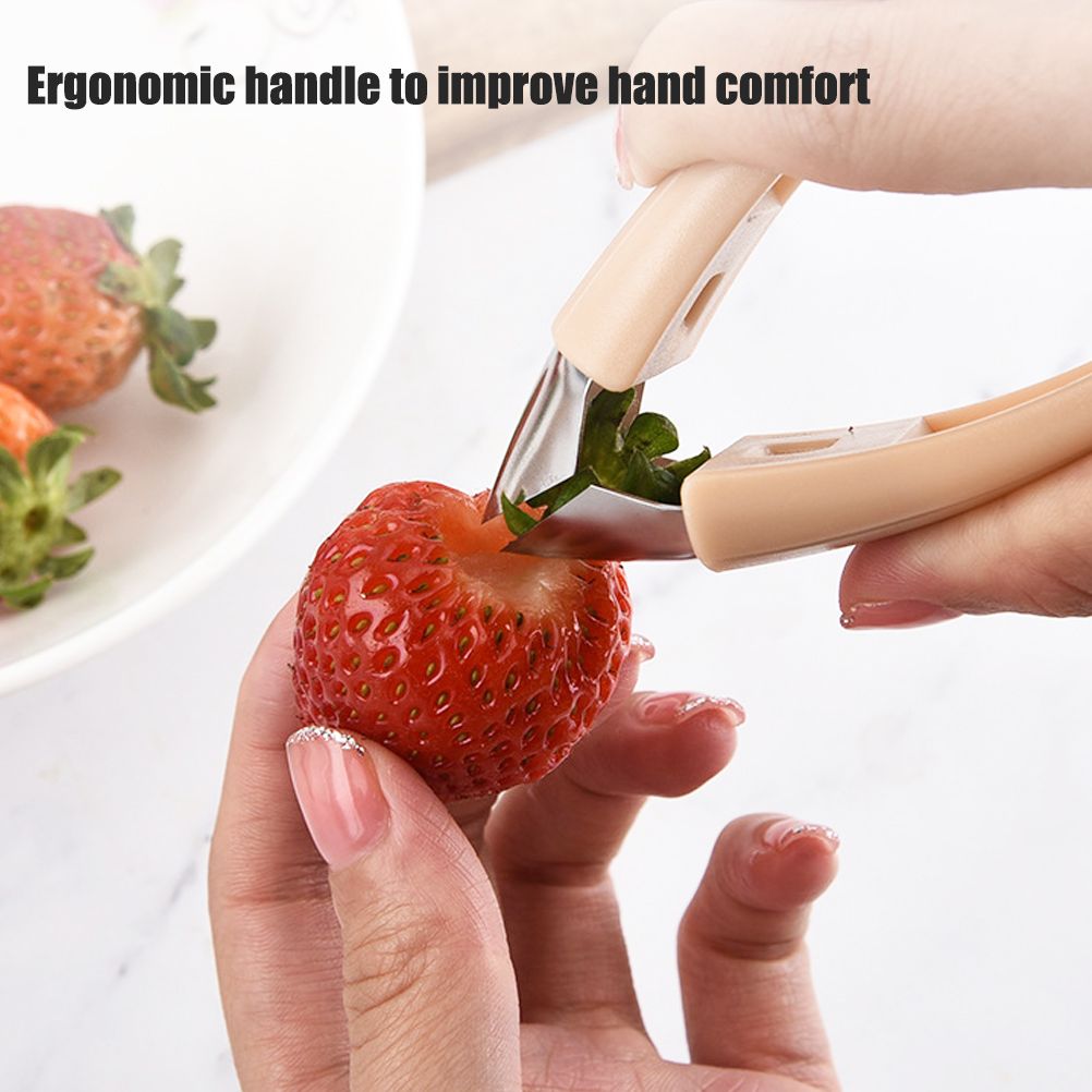 Portable strawberry huller and pineapple corer by Everything Baby, used for removing stems and coring fruits in the kitchen.