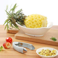 Portable strawberry huller and pineapple corer by Everything Baby, showing the kitchen gadget with fruit stems and coring blades.