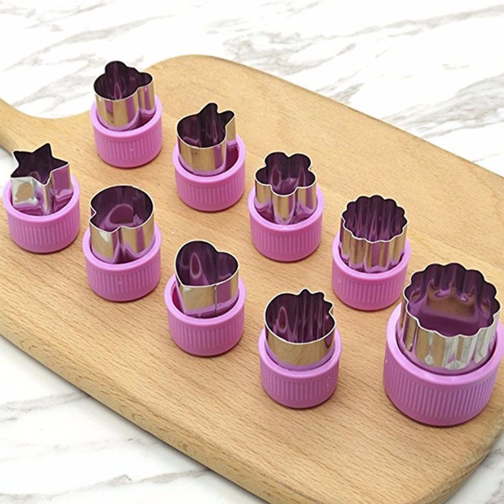 Set of 9 cartoon fruit and vegetable cutter molds for baking and fondant decoration, perfect for cake and biscuit shaping.