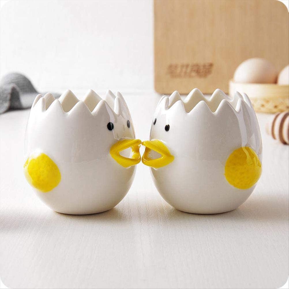 Ceramic chick-shaped egg yolk separator from Everything Baby, designed for kitchen use, ideal for separating egg whites from yolks.