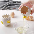 Baby chick-shaped ceramic egg separator for kitchen, designed to separate egg yolks from whites easily and precisely.