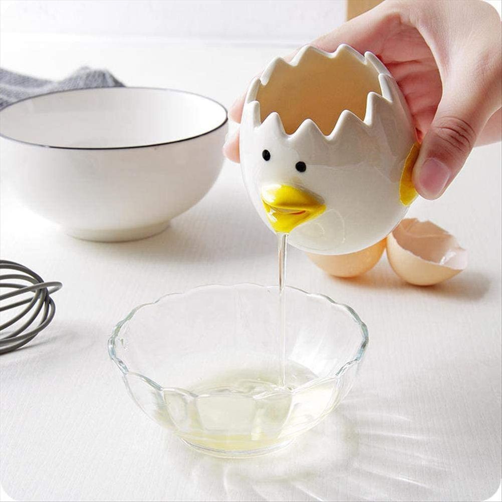 Ceramic chick-shaped egg yolk separator from Everything Baby, designed for kitchen use to easily separate egg yolks from whites.