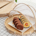 Handcrafted bamboo food serving tent with mesh cover, designed for pretend play and kid's meal table toy by Everything Baby.