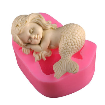 Silicone mermaid cake mold by Everything Baby, non-stick mold for pretend play and baking, featuring a detailed mermaid design.