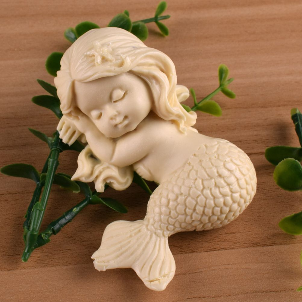 Silicone mermaid cake mold by Everything Baby, non-stick mold for pretend play and baking, shaped like a mermaid for kids' activities.