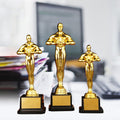 Gold plated trophy featuring a little golden man, designed for kids' outdoor play competitions, by Everything Baby.