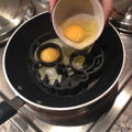 Silicone skeleton head fried egg mold from Everything Baby, shaped like a skeleton for fun pretend play breakfast creation.