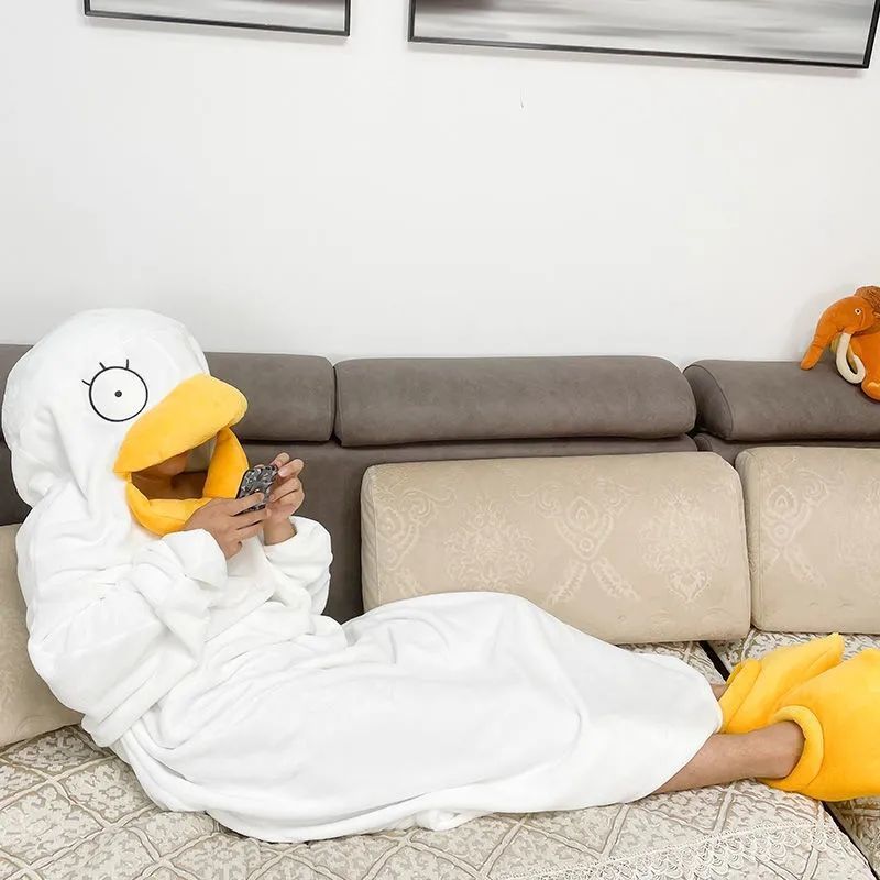 Baby duck cosplay costume in a one-piece pajamas jumpsuit, soft plush fabric, suitable for pretend play and daily wear.