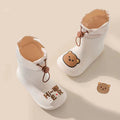 Children's waterproof rain boots by Everything Baby featuring bear design, slip-resistant soles, and drawstring closure for boys and girls.