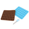Brown and blue skull silicone mold ice cube tray for Halloween decor, suitable for desserts, chocolates, and themed party treats.